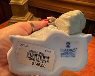 R68 - $10. Lladro 05276. Sweeping Away The Clouds.