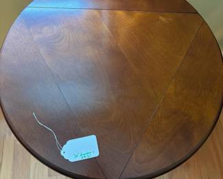 R30 - $50. Bombay Company Triple Drop Leaf Side Table. Measures 20" round x 25.5" tall. Very good vintage condition.
