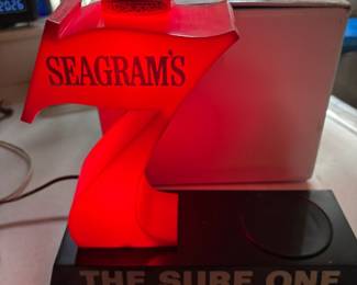 1960's Seagram's cash register light, and bottle display