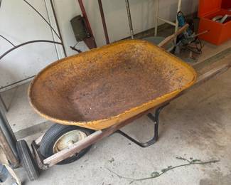 Wheelbarrow wheel holds air! antique potato planters