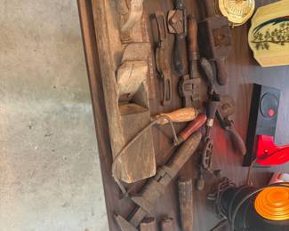 Various old wood planes and tools