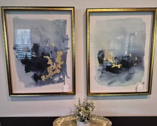 Abstract framed art in blues and golds
