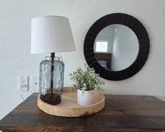 Collage with tray, mirror and lamp