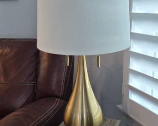teardrop shaped brass lamp