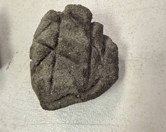 Small Lonnie Holley sandstone carving