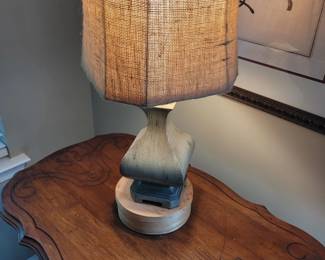 Rustic Table Lamp with distressed curved resin base and textured burlap drum shade