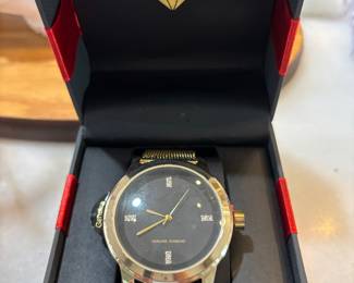 Goldtone Watch with authentic diamonds