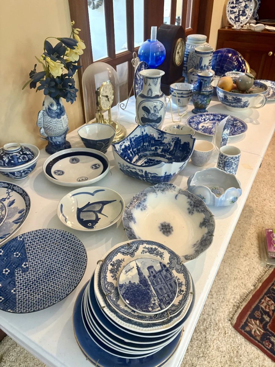 Blue and white porcelain throughout — transferware, chinoiserie-inspired pieces, Delft-style pottery, and decorative ceramics.