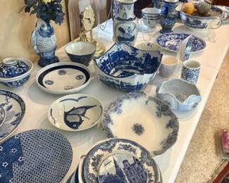Blue and white porcelain throughout — transferware, chinoiserie-inspired pieces, Delft-style pottery, and decorative ceramics.