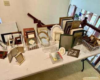 Large assortment of photo frames