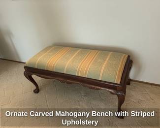 Ornate Carved Mahogany Bench with Striped Upholstery second image