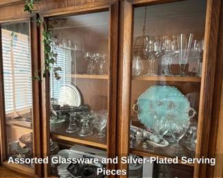 Assorted Glassware and SilverPlated Serving Pieces