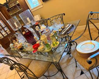 Glass and iron table with 4 side and two captain’s chairs - upholstered seats