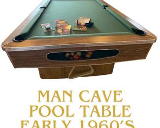1960 pool table with books and accessaries
