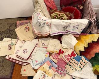 Hand embroidered tablecloths, napkins and small towels, pillows, blankets, shawls