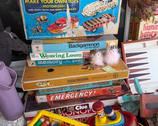 An assortment of Fisher-Price and Vintage games