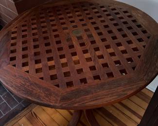 Kick accent round table with pierced lattice top on a pedestal base Vintage