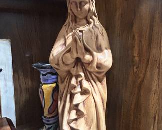 Handmade statue of Virgin Mary praying