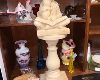 White Swan Christopher Robin stone statue on pedestal