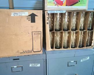 TWO CASES OF SMOKE LIBBEY GLASS TUMBLERS (OTHERS INSIDE THE HOUSE)