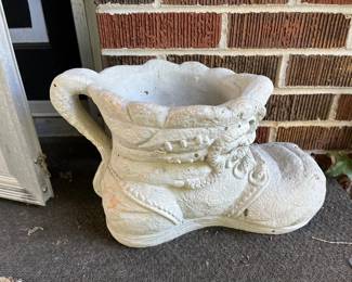 Concrete Shoe Planter. There are 2