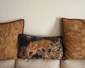 Assorted Decorative Pillows with Paisley and Wildlife Motifs