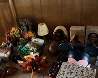 Mixed holiday and toy lot with ornaments, bells, craft items and small decor.