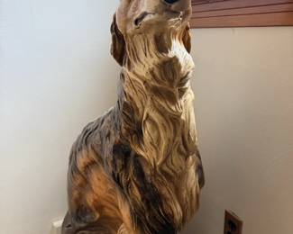 Second view of large Afghan hound-style sitting dog statue.