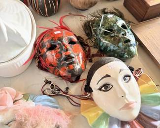 Novelty masks, character face decor and mixed toy/ceramic smalls.