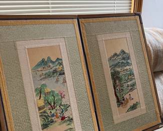 Pair of framed botanical or Asian-style prints in matching frames.