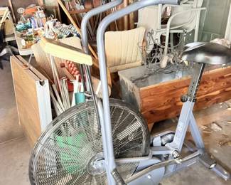 Air circulator, exercise bike or large fan plus garage equipment.