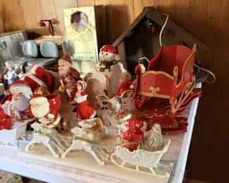 Christmas sleigh and Santa or holiday figure display.