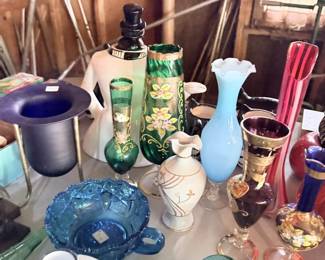 Blue, green and clear glass table grouping with vases, bowls and small pieces.