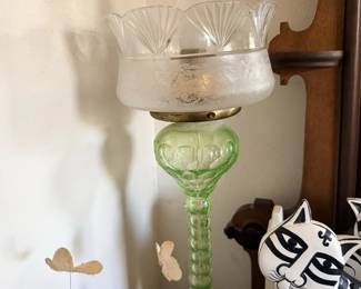Green pedestal lamp or candle holder with clear glass shade and cut-glass bowl.