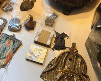 Vintage purses and wallet trinket boxes.