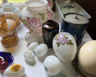 Mixed vanity and glass table lot with floral lidded jar, milk glass, crystal pieces and small bottles.