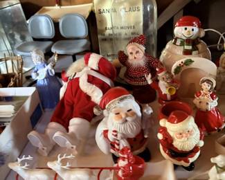 Santa figures, snowman pieces and holiday collectibles.