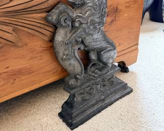 Gray stone-look guardian lion / foo dog style statue.