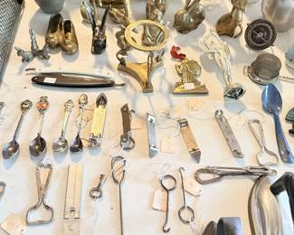 Large flat lay of hand tools, corkscrews, openers, graters, scissors and garage/kitchen tools.