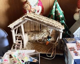 Nativity or manger scene with Christmas decorations.