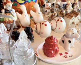 White and red painted chicken/goose pottery, egg pieces and small lidded glass.