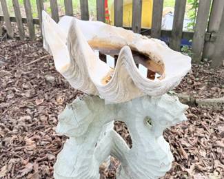 White shell or seahorse garden planter/yard art piece.