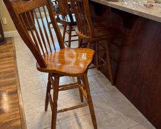 Nice barstools. High-backs, swivel-top seats, with kick stands. Everything you want in a barstool. 29" floor to seat