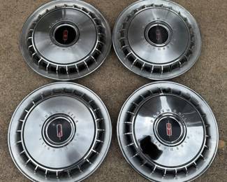 SET OF 4 OLDSMOBILE HUBCAPS