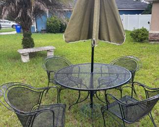 Iron patio set with iron umbrella stand