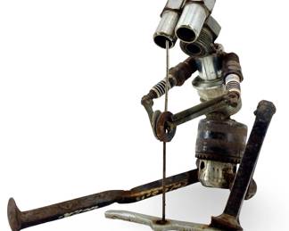 Scrap Metal Robot Starting a Fire Art