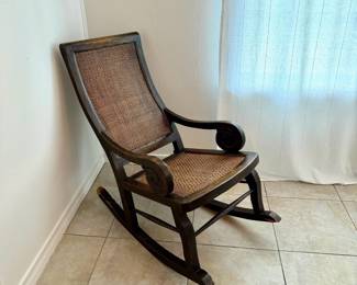 Cane seat and back antique rocking chair