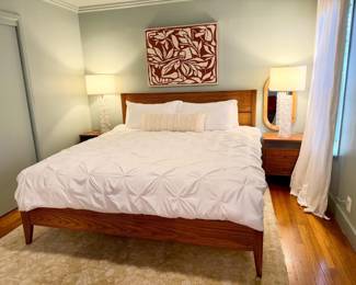 queen bed, modernist side tables with drawers and gorgeous glass table lamps