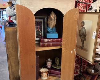 vintage cabinet, brass and books