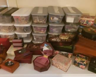 Many containers full of costume jewelry